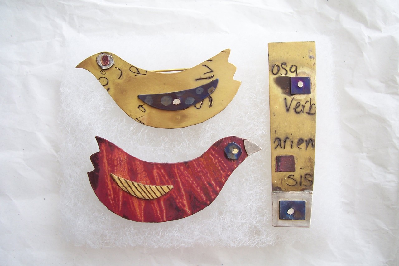 bird brooches, etched brass and red copper